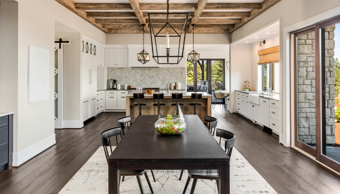 Kitchen and dining room integrated with a dining set at the center.